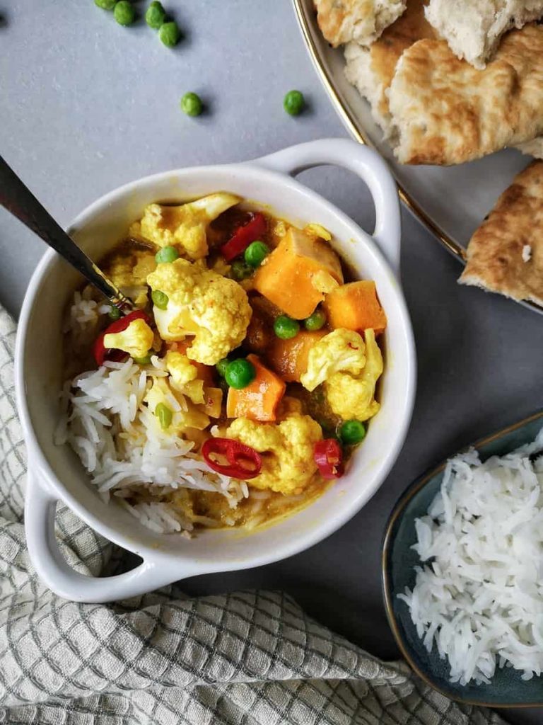 Zachte curry met pompoen en bloemkool